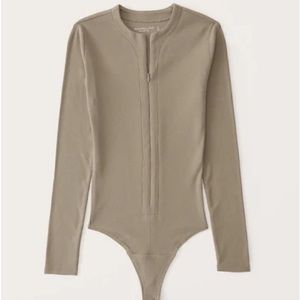 ISO	
Women's
Long-Sleeve Ribbed Zip-Up Bodysuit | Abercrombie & Fitch